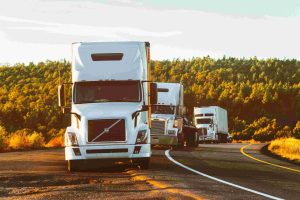 White Volvo Semi-truck on Side of Road